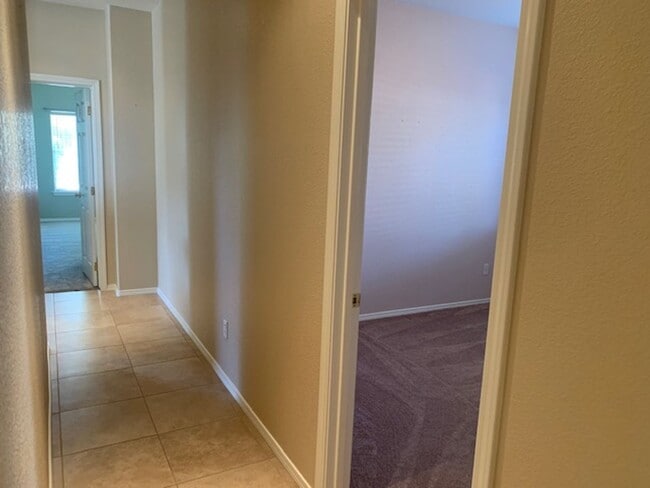 Building Photo - 3 Bedroom, 2 Bath Home with attached 3 car...
