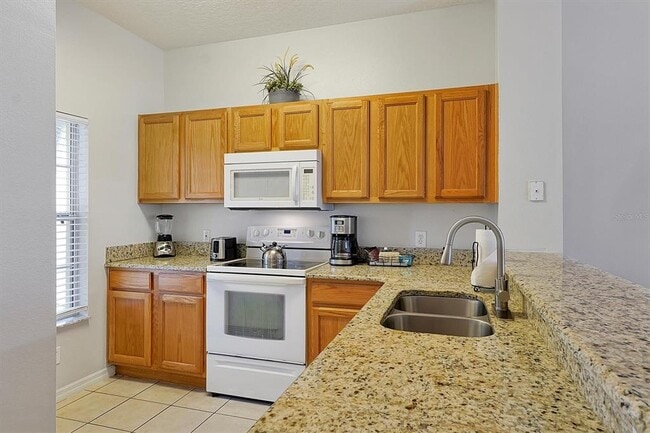 Building Photo - 8591 Bay Lilly Loop