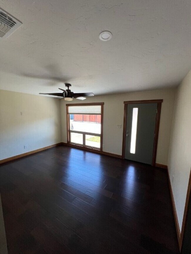 Building Photo - Artisan-Built Custom Cottage Retreat | Private Yard, Garage & EV Charging Ready