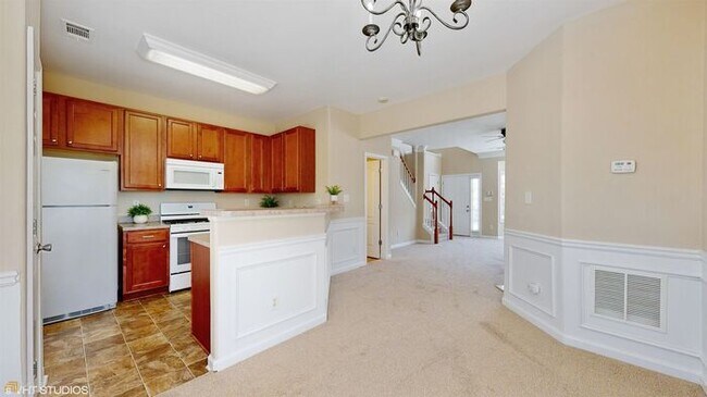 Building Photo - Coming Soon! Exceptional 2BR/2.5BA End Unit Townhome in College Park!