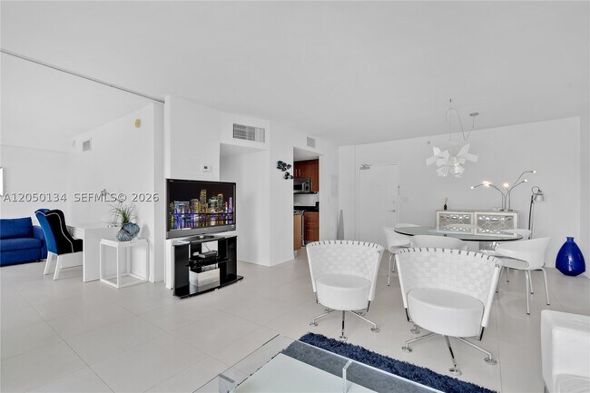 Building Photo - 10275 Collins Ave