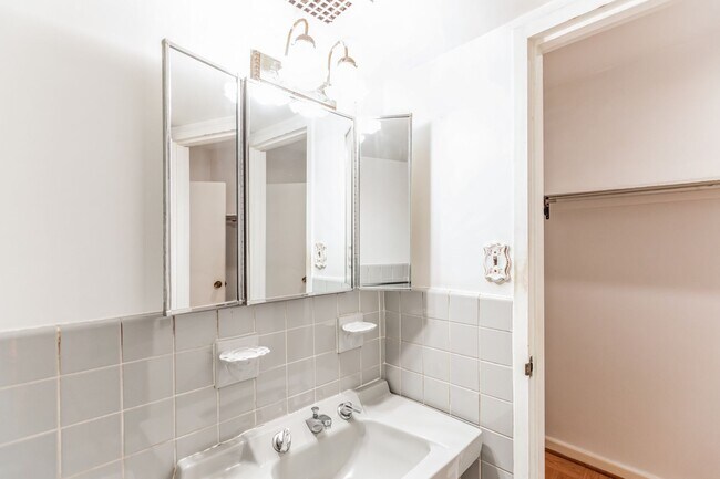 Building Photo - Light-filled studio in the prestigious Towers Condominium, nestled in the heart of Wesley Heights...