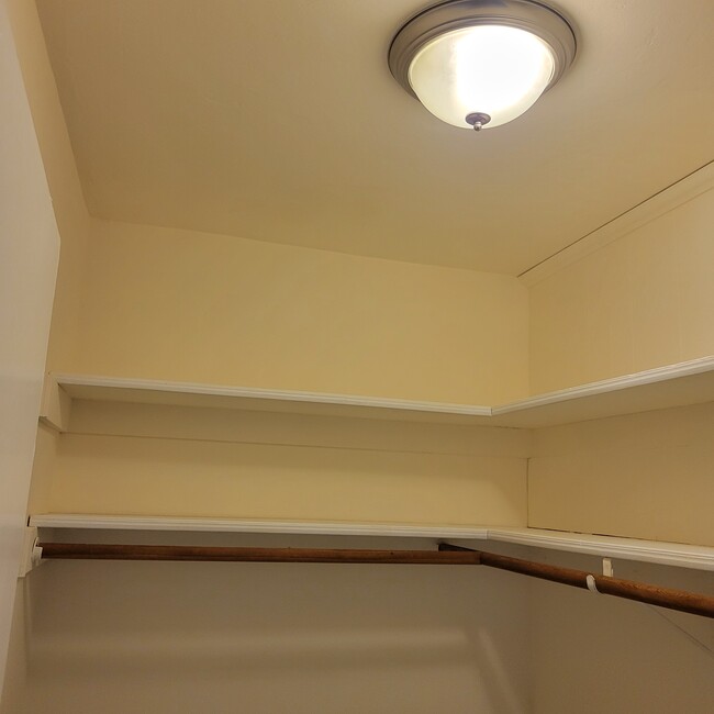 walk in closet with overhead shelving - 2031 NE 56th St