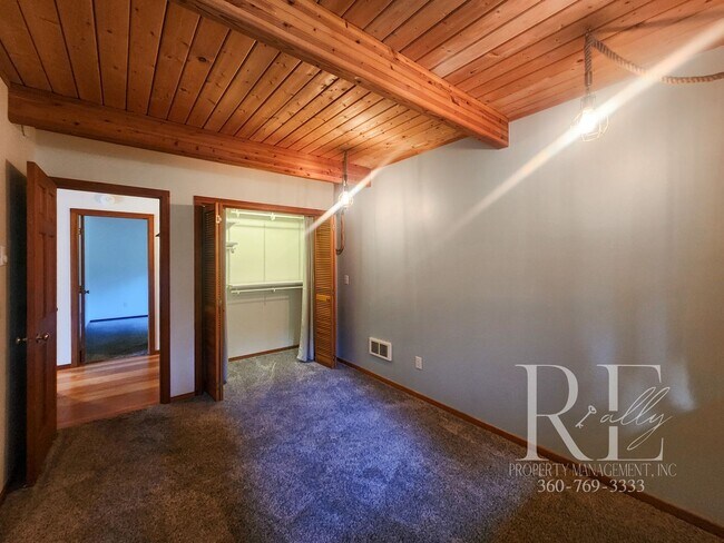 Building Photo - Waterfront Living in Indianola – Dock, Bea...