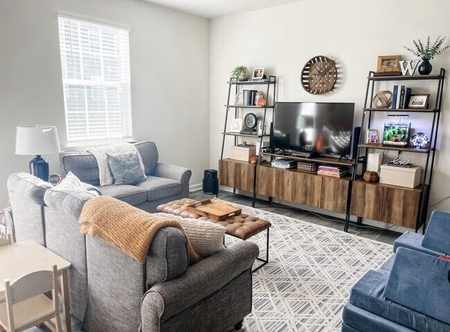 Building Photo - Free Application Fee — Refunded Upon Approval Through August 31! Modern 3BR/3BA Townhome with Gar...