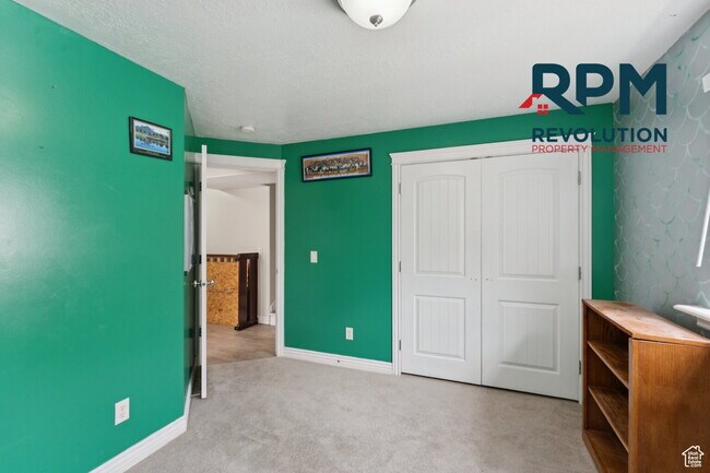 Building Photo - "Spacious 6-Bed Gem with Granite Touches & Cozy Fireplace in Morgan!"