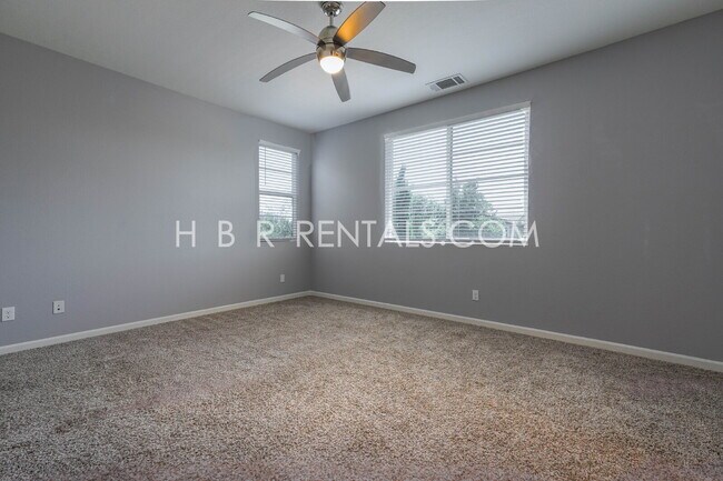 Building Photo - Questa Village: Spacious 3-Bedroom Retreat...