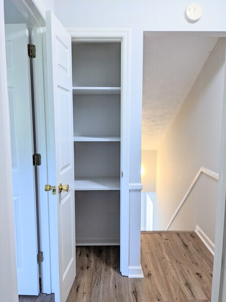 Linen closet at top of stairs - 3221 Hunters Point Dr