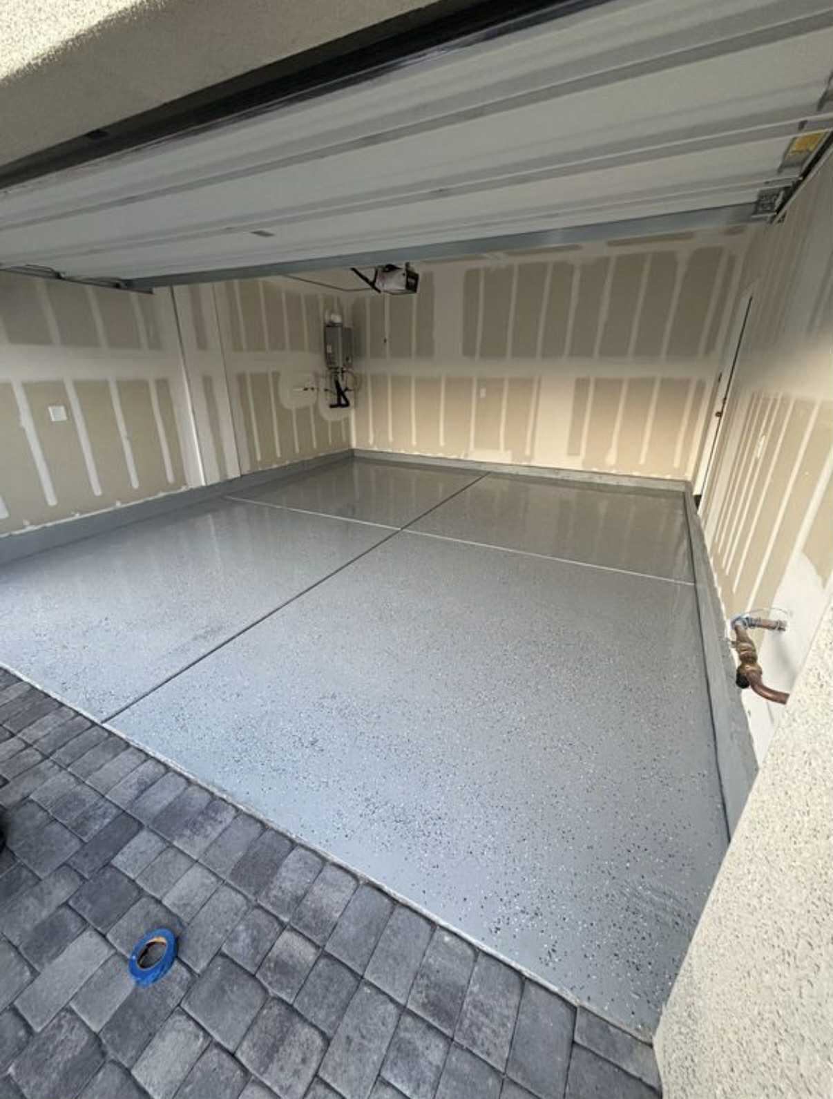 epoxy finished elevated garage flooring complete with water softener( not pictured) - 5924 Tomsik St