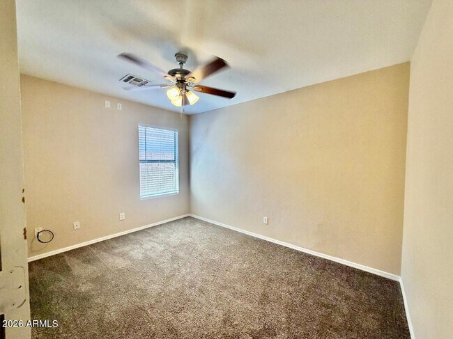 Building Photo - 9323 W Harmony Ln