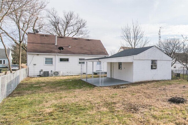 Building Photo - Spacious 4-Bedroom, 2-Bath Home with Garag...