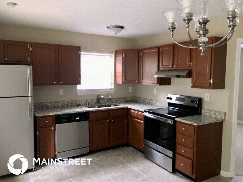 Building Photo - 10414 Pebblestone Cir