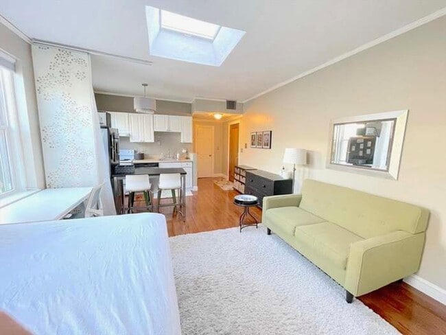 Building Photo - NO FEE!!  Sunny studio on Commonwealth Ave. with dishwasher