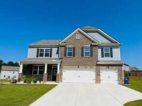 Building Photo - WOW! 5 bedrooms, 4.5 baths with a guest be...