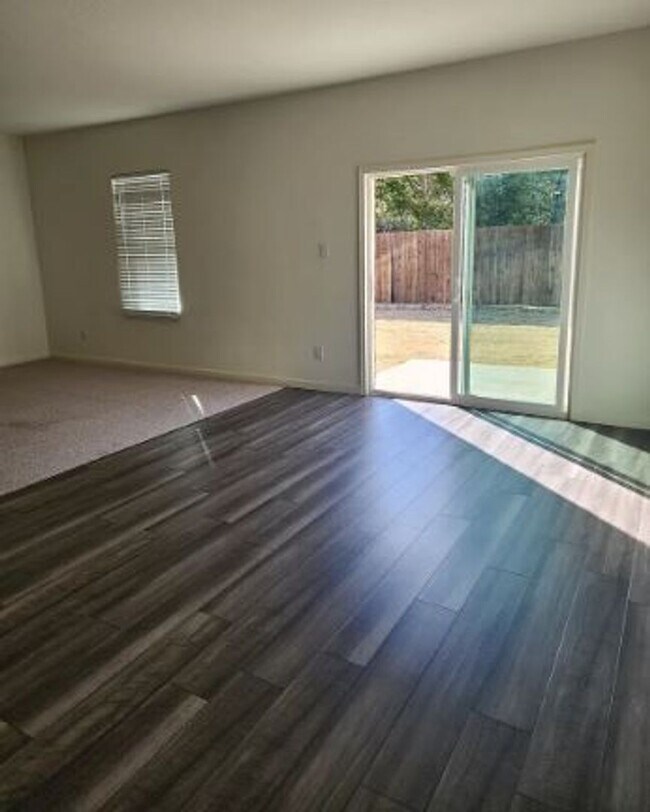 Building Photo - Backs to Wooded Area • Split Bedrooms • Modern & All-Electric