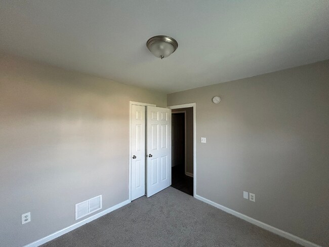 Building Photo - Spacious 4BR/2BA Olive Branch Home | 1,965 Sq Ft, Modern Fireplace, Bay Window & 2-Car Garage