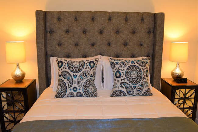 Super comfy queen size bed with memory foam topper and luxurious linens (extra sets provided). - 2125 Southend Drive