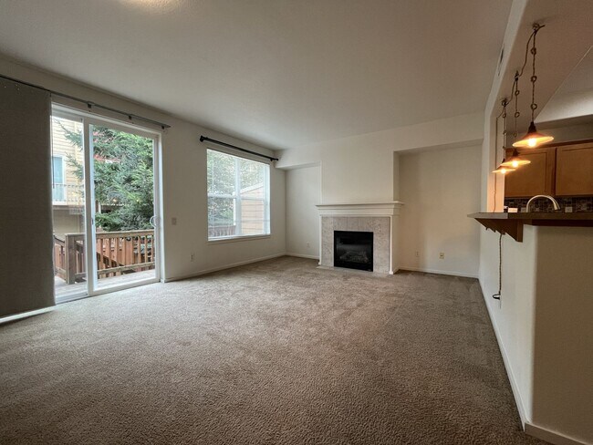 Building Photo - Beautiful 2 Bedroom Townhome with Walk-In Closets Private Deck & Attached Garage