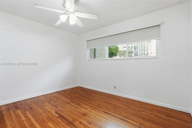 Building Photo - 9881 W Bay Harbor Dr