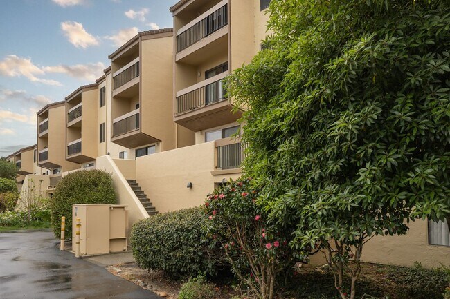 Building Photo - Peaceful Forest-View Condo with Fireplace & Private Balcony in Golden Oaks