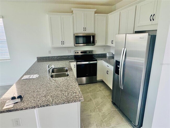 Building Photo - 3156 Gardenia Reserve St