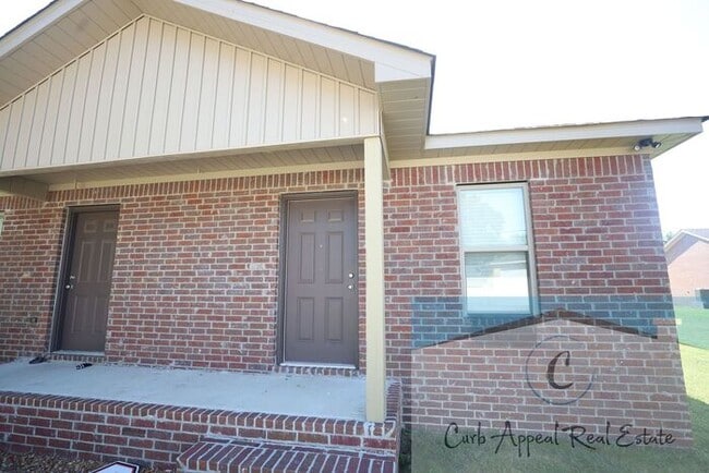 Building Photo - Move in special $800!! Luxury 2 bed, 1 bath duplex - new construction!! Washer, dryer, utilities ...