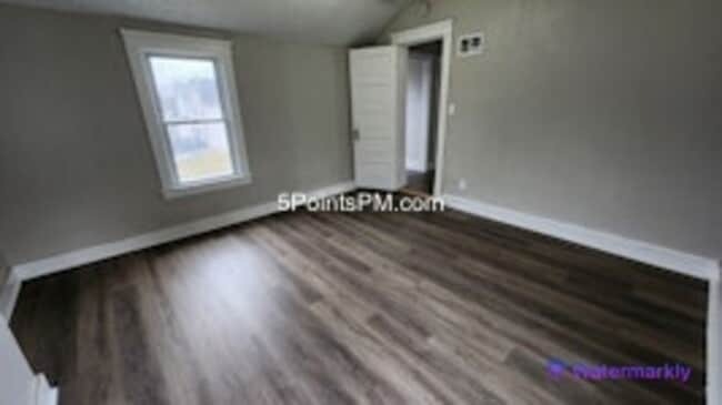 Building Photo - 9804 Miles Ave