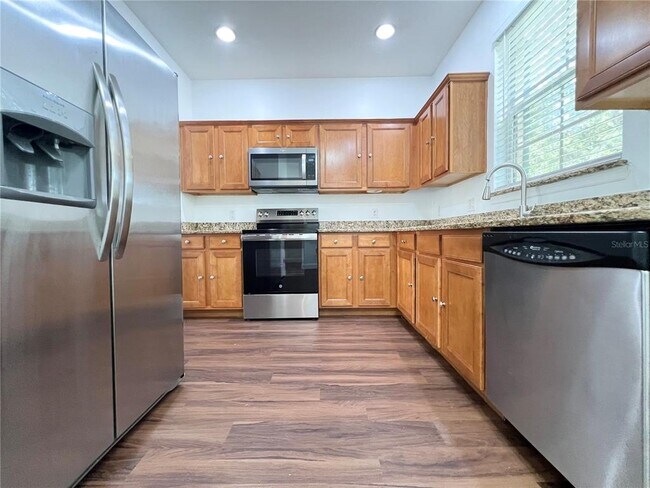 Building Photo - 7138 Five Oaks Dr