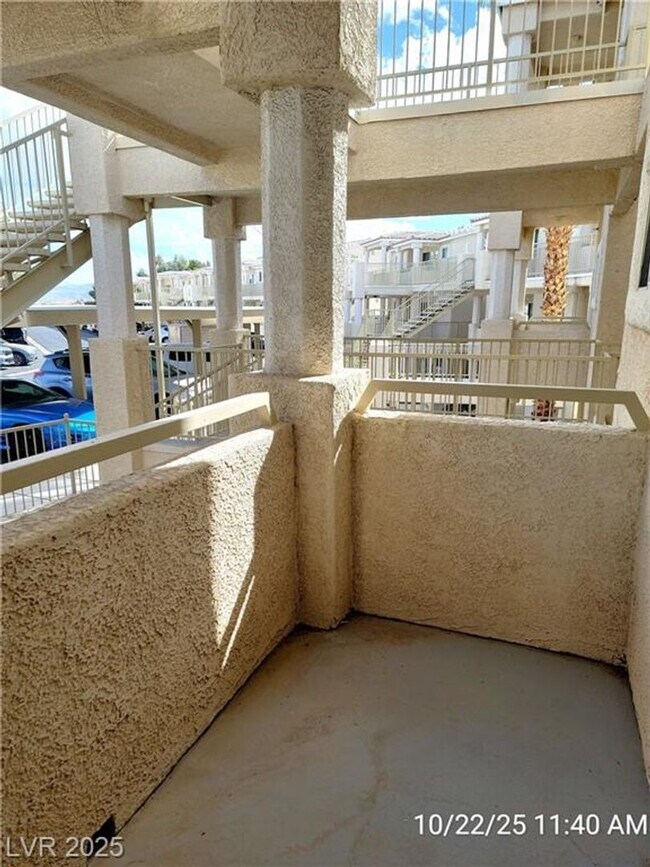 Building Photo - Inviting Green Valley Condo with Dual Balc...