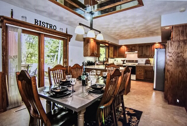 Dining room looking into kitchen - 808 Pony Ln