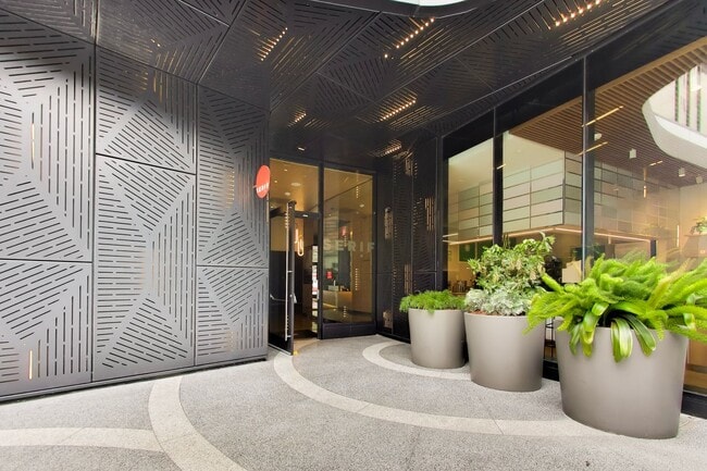 Building Photo - Urban Luxury at SoMa Serif Condos 2BR/2BA | In-Unit Laundry & 24-Hour Security