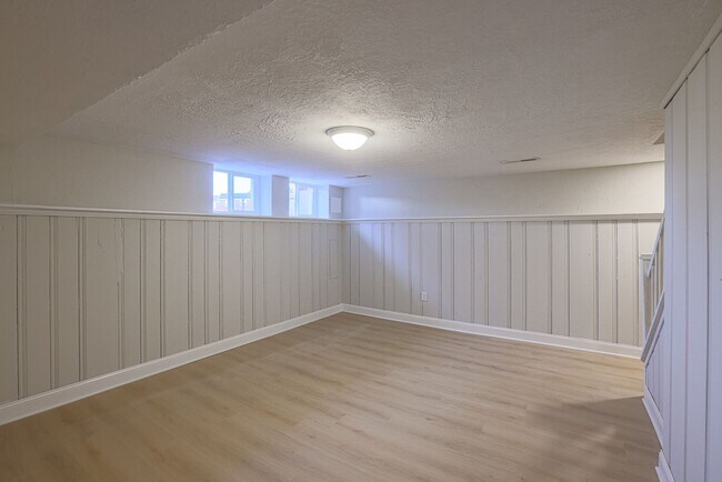 Building Photo - RENOVATED PARKVILLE TOWNHOME 3BR 1.5BA