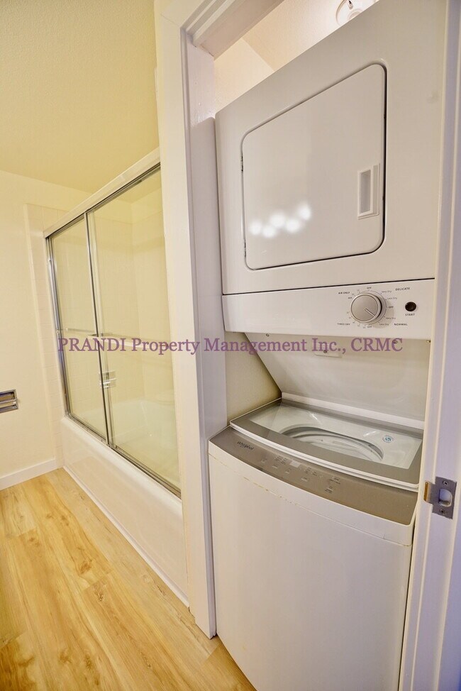 Building Photo - Wood burning fireplace in this updated 2 b...