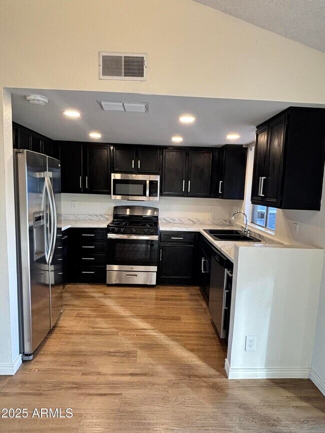 Building Photo - 8735 W Hazelwood St