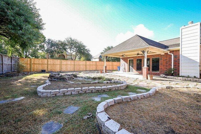 Building Photo - Discover this stunning one-story corner lo...