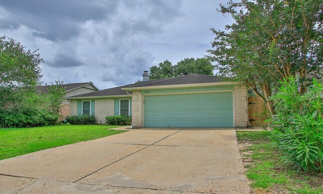 Building Photo - 4 Bedroom 2 Bathroom Cypress Home with Fireplace and Fenced Backyard