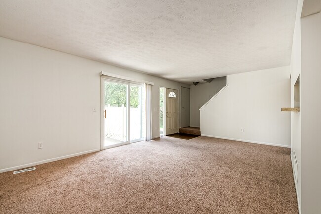 Living Room to Private Patio - Cunard Village Apartments