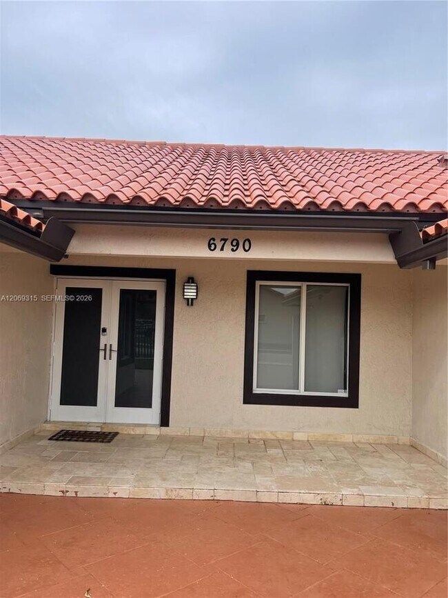 Building Photo - 6790 SW 105th Ave