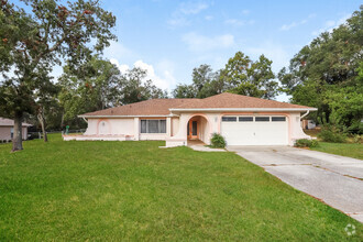 Building Photo - Spacious 4-Bedroom Home with Enclosed Pool