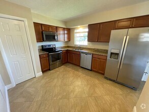 Building Photo - ANNUAL RENTAL - POINCIANA-2 BED-1 BATH