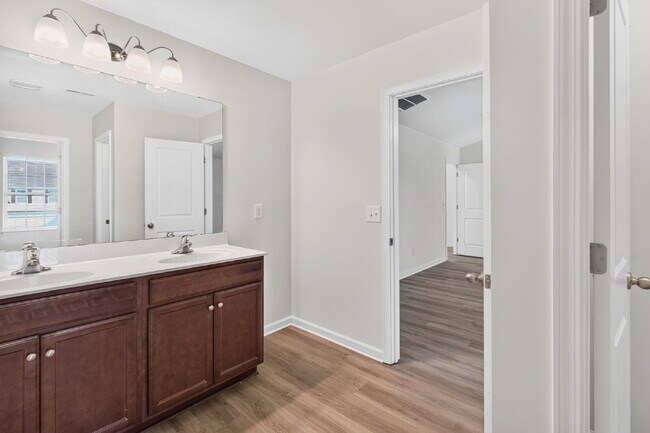 Building Photo - Expansive 4-bedroom, 3.5-bathroom single-family home boasts 3,150 sq. ft.
