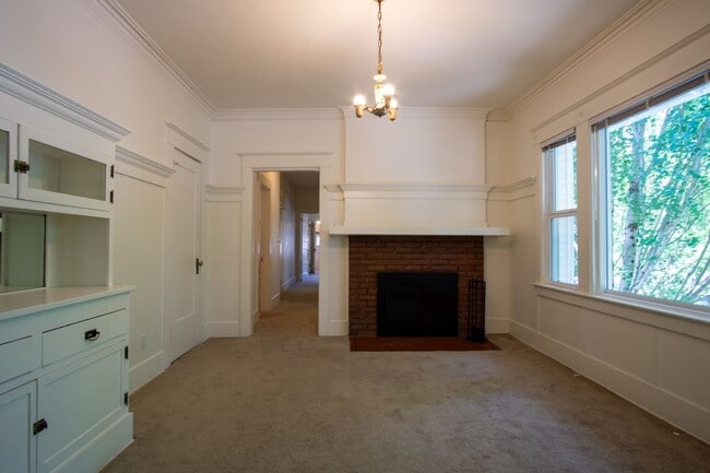 Building Photo - Lease this Beautiful Sullivan's Gulch Vintage 2-Bed w/Sunroom!