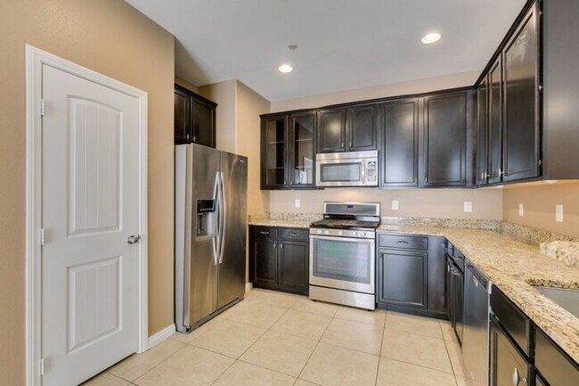 Building Photo - Better Than New with Stunning Designer Upgrades Throughout!