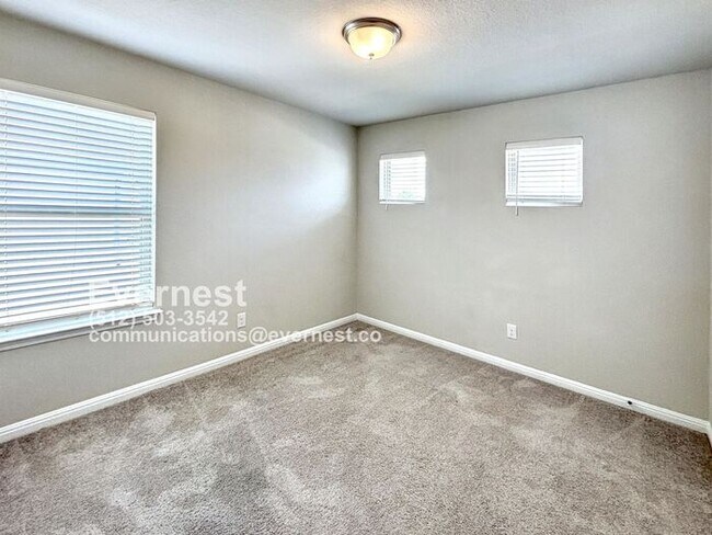 Building Photo - 4-Bedroom Home with Modern Comforts Near S...