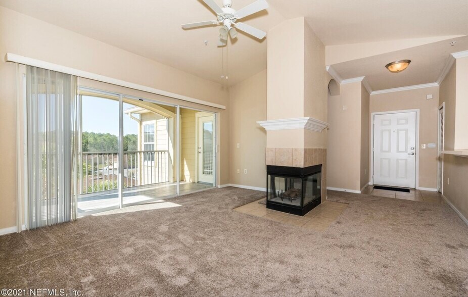 Living room & screened terrace - 275 Old Village Center Cir