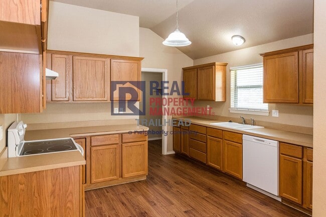 Building Photo - Well-Maintained Home with Large Yard and Storage Shed