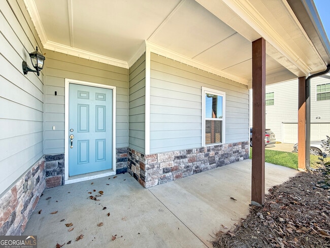 Building Photo - 6369 Woodland Station Dr