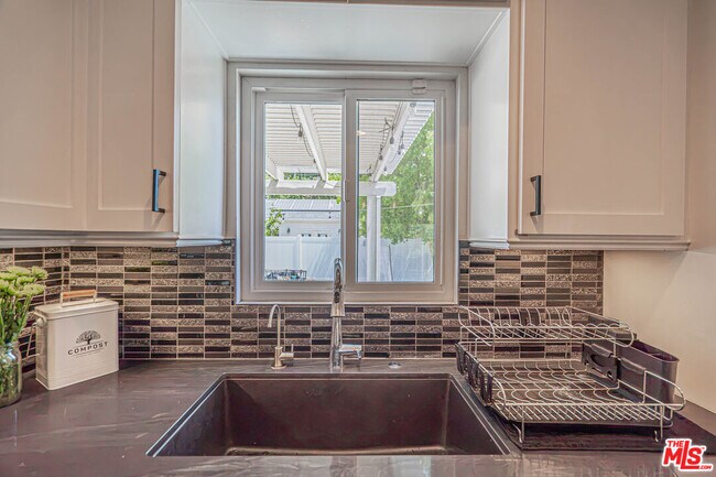 Building Photo - 7044 Garden Grove Ave