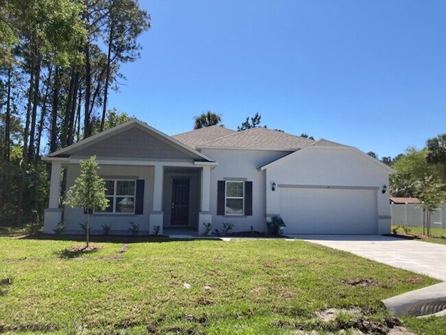 Building Photo - Like New 3 bedroom + den with French doors...