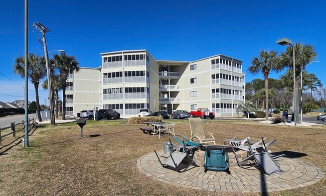 Building Photo - Dreamy Little River Condo — Furnished, Elevator Access, Pool & Marina Nearby!